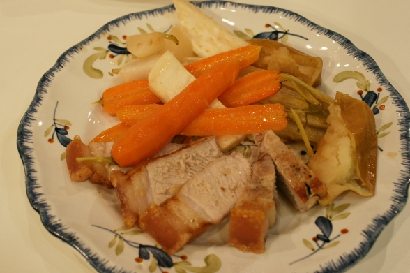 Côte de porc et sa couenne croustillante